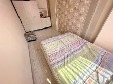 ліжко у спальні