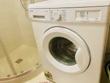 пральна машина у ванній