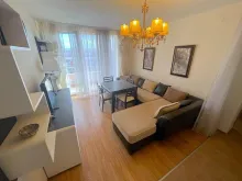 вітальня трикімнатної квартири в комплексі Holliday Fort Club