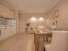 Sun City 1 | Двокімнатна квартира: вітальня, кухня, їдальня.