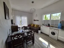 Magnolia Residence-6 | Двокімнатна квартира: вітальня, кухня
