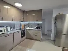 вітальня, кухня /Інтер’єр та меблювання