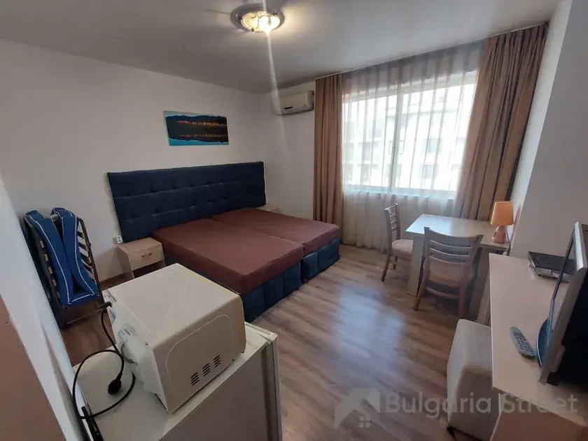 Salon jednopokojowego mieszkania w kompleksie Avalon